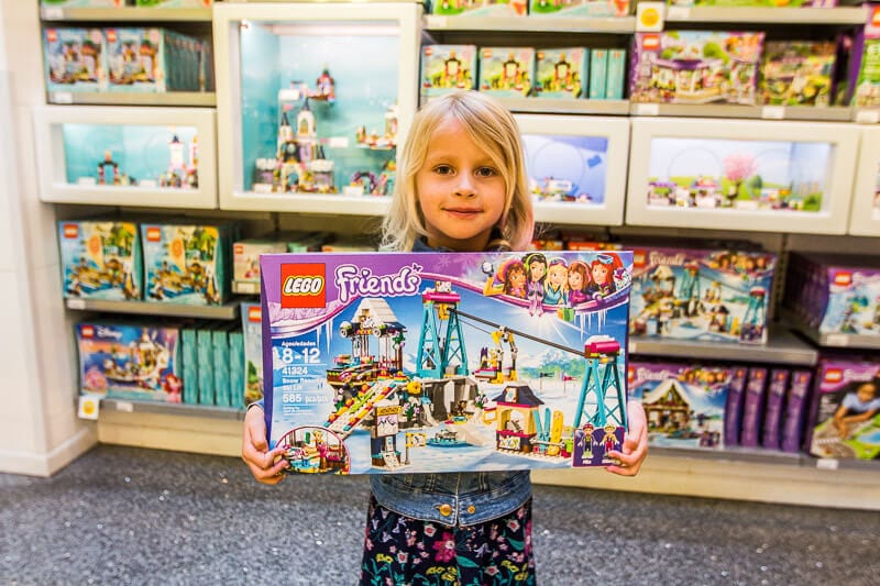 girl holding up  Lego Store at Mall of America