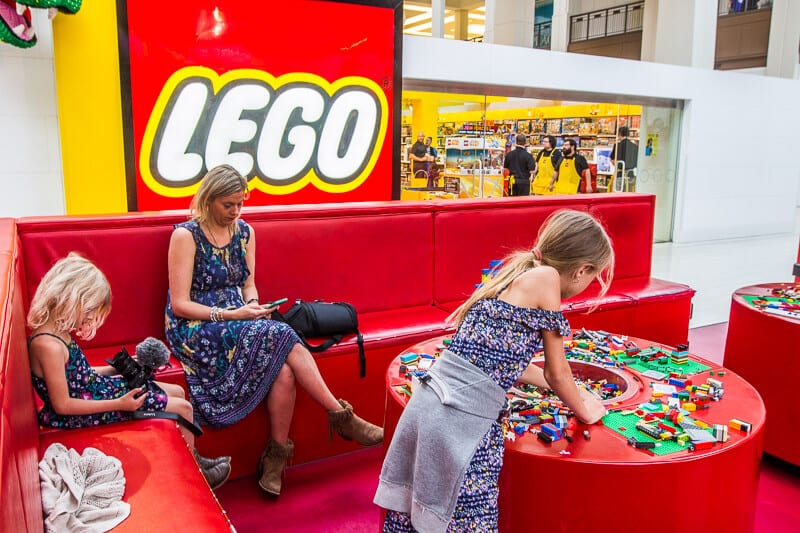 family doing lego at the Lego Store at Mall of America