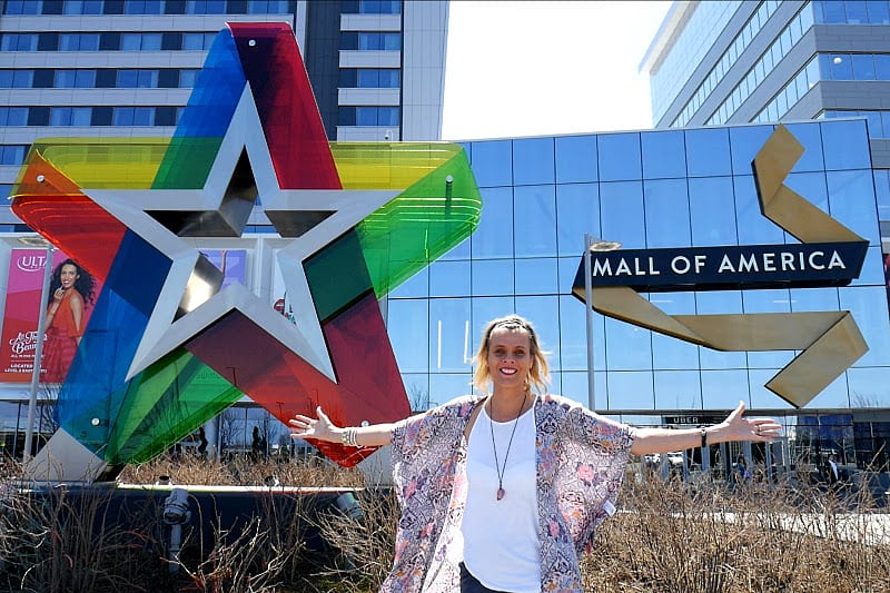 woman standing outside Mall of America, Bloomington, Minnesota