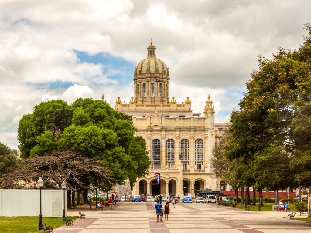  View of the Museum of the Revolition, in Havana Cuba on a background of blue sky with clouds. 