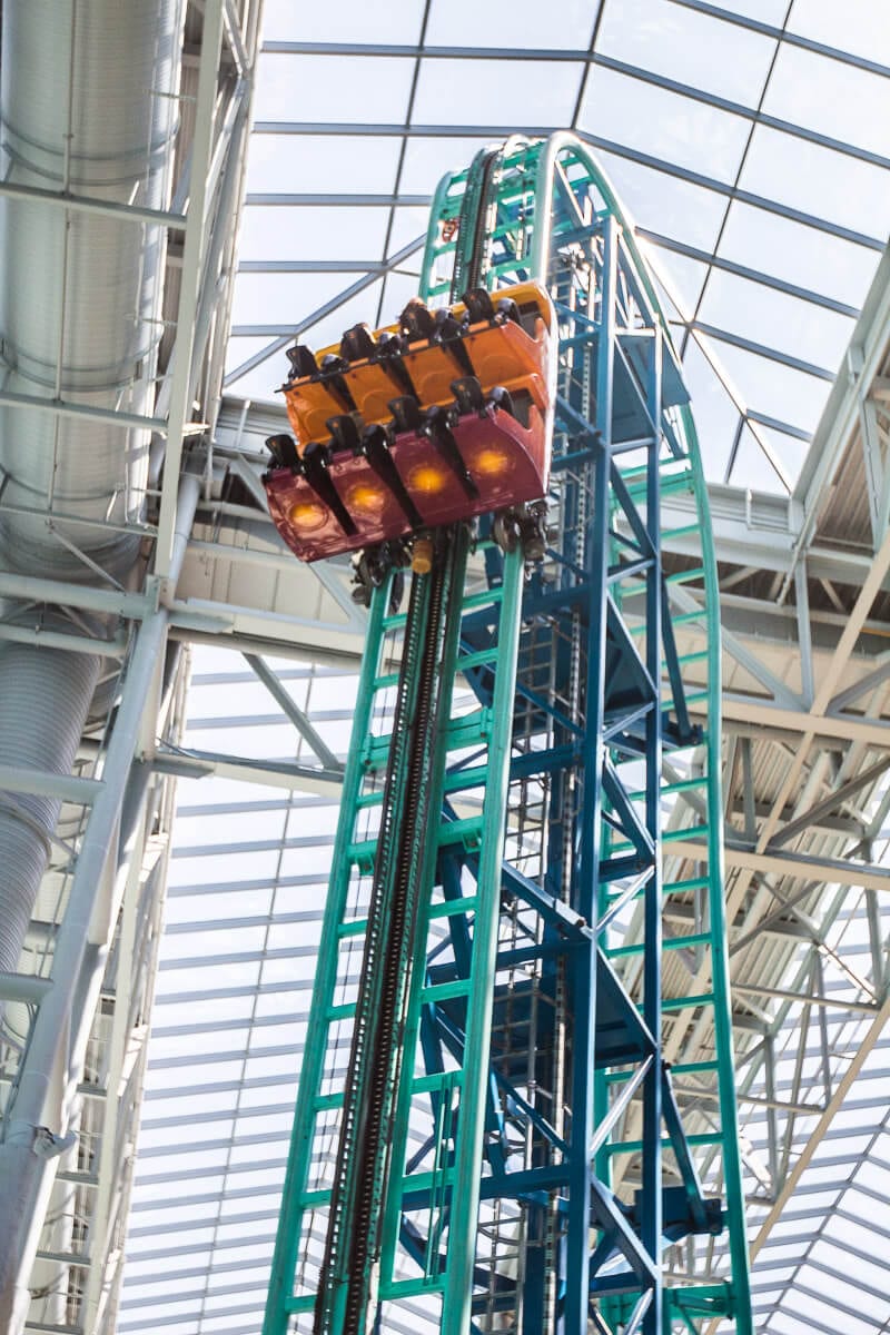 people on roller coaster in mall of america