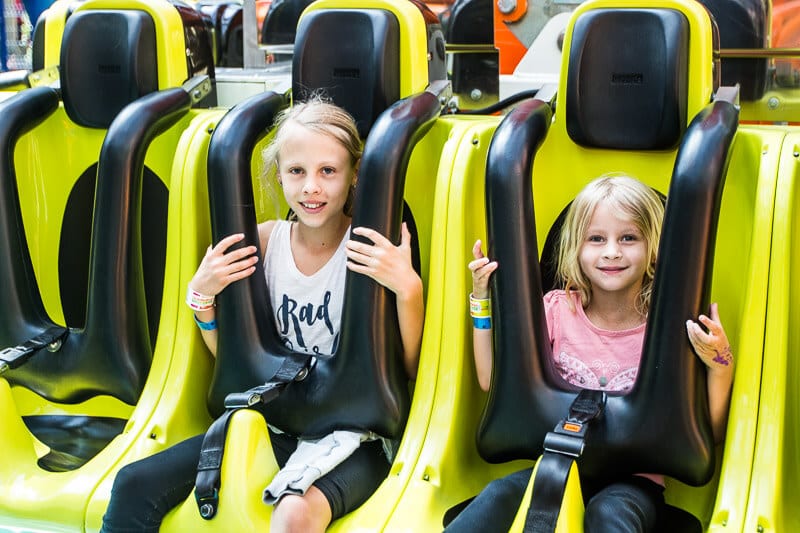 girls sitting in seat of Splat-O–Sphere, Mall of America