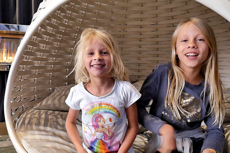 girls sitting on a couch