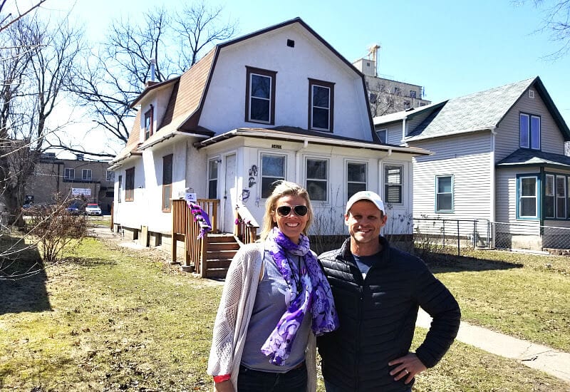 couple standing outside Prince House featured in Purple Rain