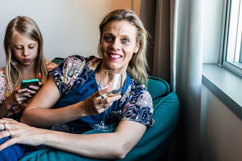 woman  with wine glass in Radisson Blu MOA Business Lounge