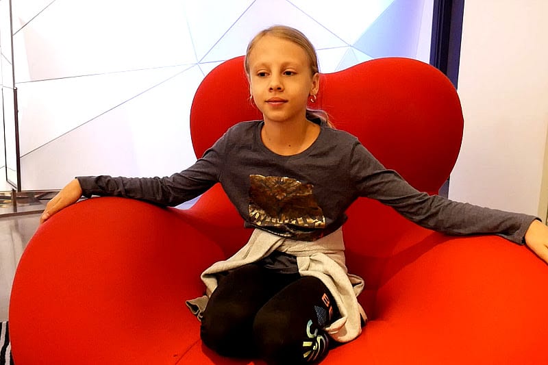 girl sitting on a chair