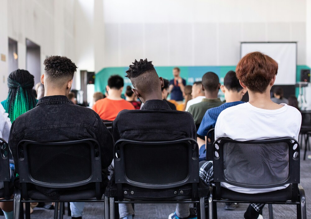 people in classroom learning spanish