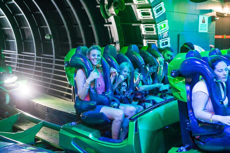 mom and child smiling on The Incredible Hulk Coaster