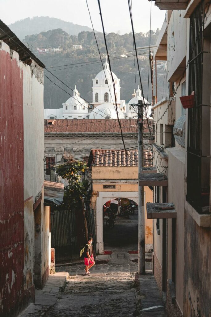 person walking the streets in xela guatemala